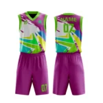 Custom basketball uniform in magenta with vibrant multicolor geometric patterns, front and back views.