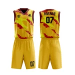 Custom basketball uniform in yellow with red accents, featuring a unique camouflage design.