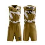 Custom basketball uniform in gold with dynamic white brushstroke pattern, stylish and bold.