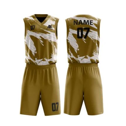Custom basketball uniform in gold with dynamic white brushstroke pattern, stylish and bold.