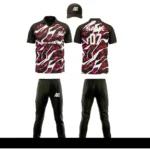Custom cricket uniform kit with a bold pink and black abstract design, featuring a cap, jersey, and trousers by Adrees Enterprises.