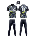 Custom cricket uniform kit with a yellow and black abstract design, including a cap, jersey, and trousers by Adrees Enterprises.
