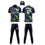 Custom cricket uniform kit with a green and blue abstract design, including a cap, jersey, and trousers by Adrees Enterprises.