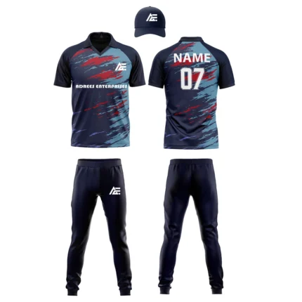 Custom cricket uniform kit with a navy and red abstract design, including a cap, jersey, and trousers by Adrees Enterprises.