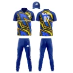 Custom cricket uniform kit in blue and gold featuring a bold angular pattern and branding by Adrees Enterprises.