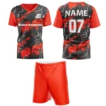 Red custom field hockey uniform by Adrees Enterprises, featuring a bold abstract pattern and customizable back number.