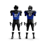 Black and blue football uniform with sleek geometric patterns.