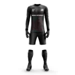 Black goalkeeper kit with subtle red and teal pattern details by Adrees Enterprises.