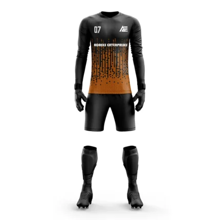 Custom goalkeeper kit with a black and orange gradient design by Adrees Enterprises.