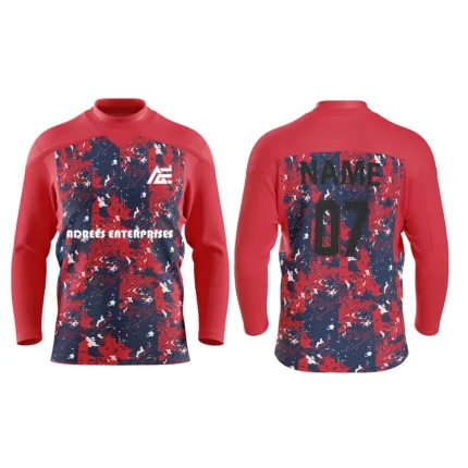Custom red and navy ice hockey jersey by Adrees Enterprises featuring a bold camouflage design with personalized name and number.