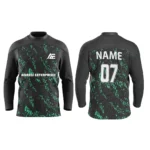 Black custom ice hockey jersey with green abstract details by Adrees Enterprises.