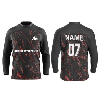 Black custom ice hockey jersey with red abstract patterns by Adrees Enterprises.